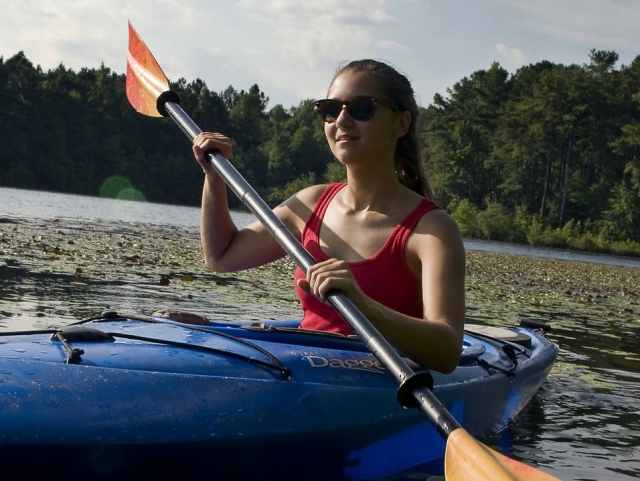 Woman kayaking in the sun